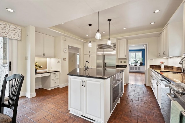 155 Westland Dr, Squirrel Hill, PA 15217 - kitchen featuring stainless steel appliances, a sink, a kitchen island with sink, white cabinetry, and recessed lighting