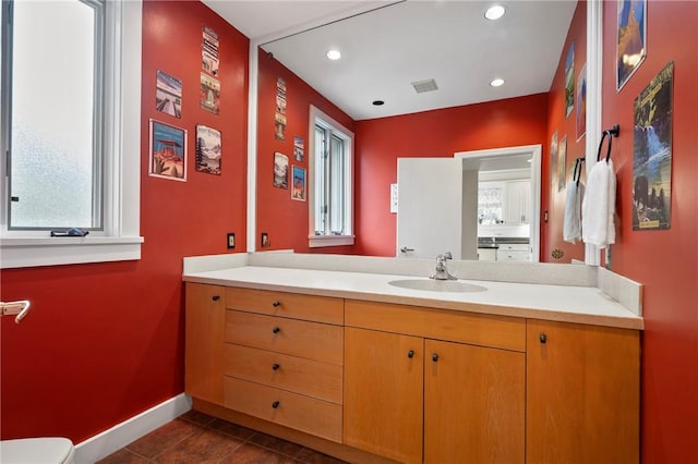 155 Westland Dr, Squirrel Hill, PA 15217 - bathroom featuring baseboards, vanity, healthy amount of natural light, recessed lighting, and tile patterned flooring