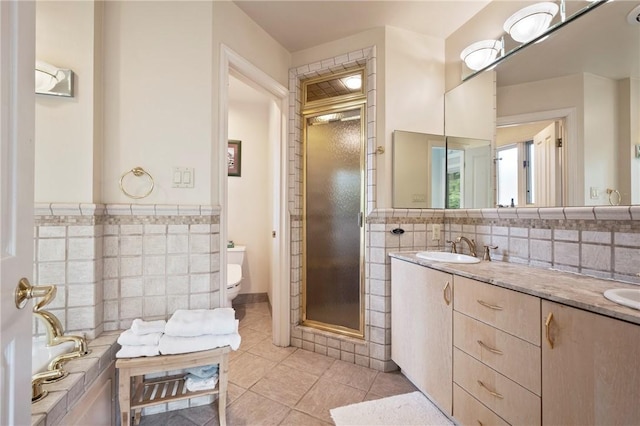 155 Westland Dr, Squirrel Hill, PA 15217 - bathroom with tile walls, tile patterned flooring, a stall shower, toilet, and double vanity