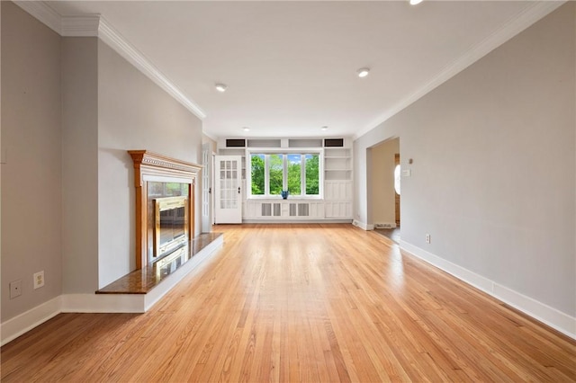 155 Westland Dr, Squirrel Hill, PA 15217 - unfurnished living room with crown molding, light wood-style flooring, baseboards, a fireplace, and recessed lighting
