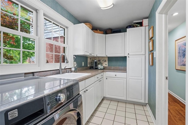 111 Maple Dr, Pine Twp Nal, PA 15090 - laundry area featuring cabinet space, washer and dryer, healthy amount of natural light, and baseboards