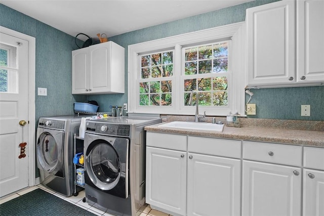 111 Maple Dr, Pine Twp Nal, PA 15090 - laundry area with cabinet space, plenty of natural light, light tile patterned floors, and wallpapered walls