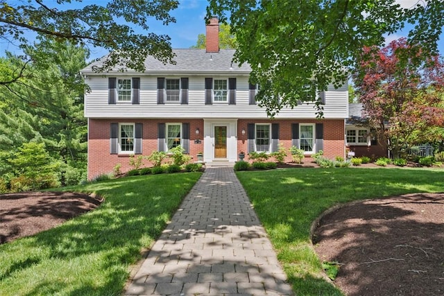 111 Maple Dr, Pine Twp Nal, PA 15090 - view of front of house featuring brick siding, a chimney, and a front yard