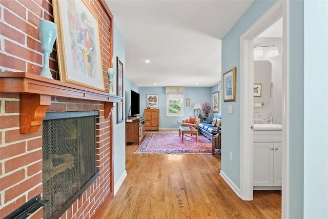 111 Maple Dr, Pine Twp Nal, PA 15090 - hall with light wood-type flooring, a sink, baseboards, and recessed lighting