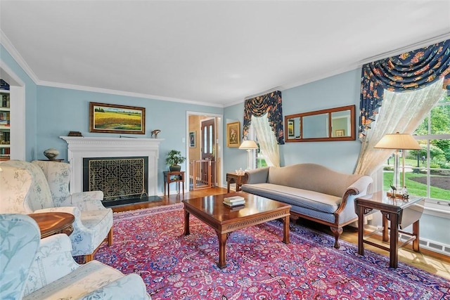 111 Maple Dr, Pine Twp Nal, PA 15090 - living room featuring wood finished floors, crown molding, and a fireplace with raised hearth