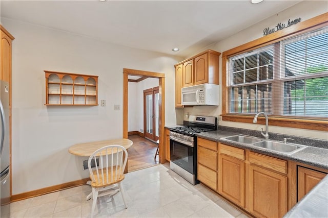 245 Martsolf Ave, West View, PA 15229 - kitchen with stainless steel appliances, a sink, dark countertops, baseboards, and recessed lighting