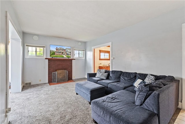 245 Martsolf Ave, West View, PA 15229 - living room with plenty of natural light, a brick fireplace, and carpet