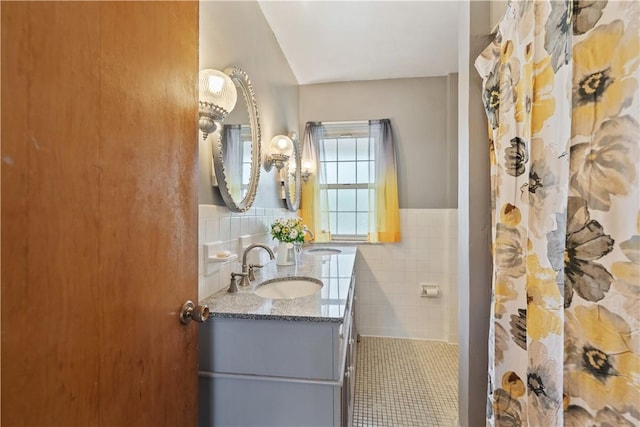 245 Martsolf Ave, West View, PA 15229 - full bathroom featuring tile walls, vanity, tile patterned flooring, and wainscoting