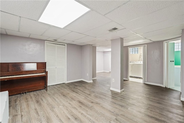 245 Martsolf Ave, West View, PA 15229 - finished basement with washer / clothes dryer, wood finished floors, baseboards, and a paneled ceiling