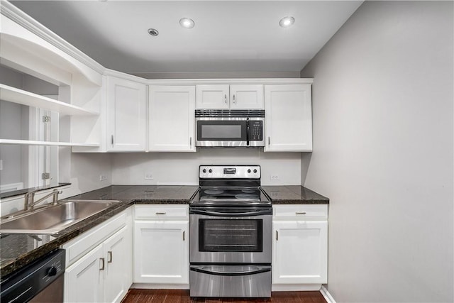 130 S 22nd St Unit 2C, South Side, PA 15203 - kitchen featuring appliances with stainless steel finishes, a sink, open shelves, white cabinetry, and recessed lighting