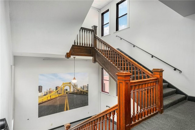 130 S 22nd St Unit 2C, South Side, PA 15203 - stairs featuring a towering ceiling and carpet floors
