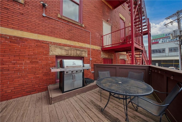 130 S 22nd St Unit 2C, South Side, PA 15203 - wooden terrace featuring grilling area, outdoor dining space, and stairs