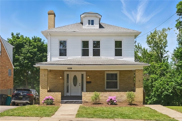 5241 Clarwin Ave, Ross Twp, PA 15229 - american foursquare style home featuring covered porch, brick siding, a chimney, and roof with shingles