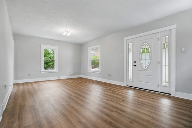 5241 Clarwin Ave, Ross Twp, PA 15229 - entrance foyer featuring healthy amount of natural light, wood finished floors, and baseboards