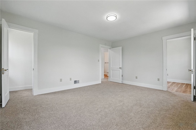 5241 Clarwin Ave, Ross Twp, PA 15229 - unfurnished bedroom with carpet flooring, a spacious closet, and baseboards