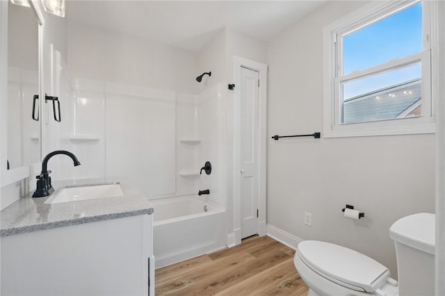 5241 Clarwin Ave, Ross Twp, PA 15229 - full bath with washtub / shower combination, toilet, vanity, wood finished floors, and baseboards