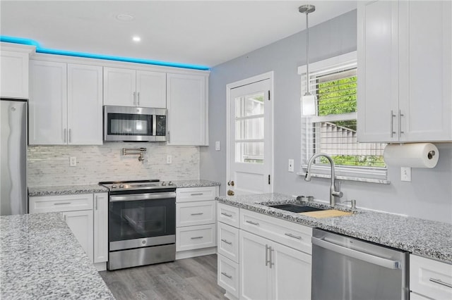 259 Allison Ave, Emsworth, PA 15202 - kitchen with stainless steel appliances, a sink, and white cabinets