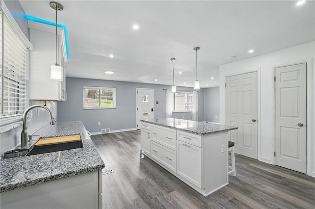 259 Allison Ave, Emsworth, PA 15202 - kitchen featuring a sink, white cabinets, dark wood-style flooring, recessed lighting, and plenty of natural light