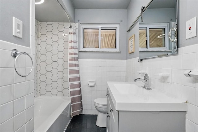 259 Allison Ave, Emsworth, PA 15202 - bathroom featuring tile walls, tile patterned floors, vanity, toilet, and a wainscoted wall
