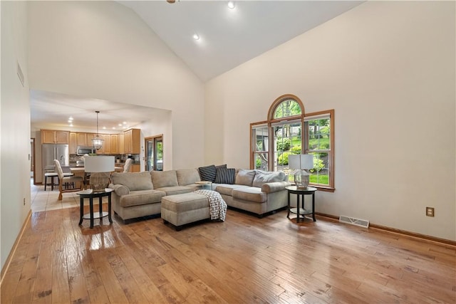 321 Ivy Dr, Pine Twp Nal, PA 15044 - living area featuring light wood-style flooring, high vaulted ceiling, and recessed lighting