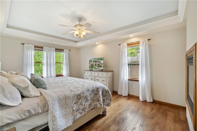 321 Ivy Dr, Pine Twp Nal, PA 15044 - bedroom featuring a tray ceiling, light wood-style floors, ceiling fan, and crown molding