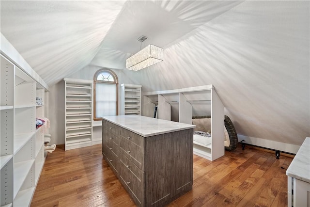 321 Ivy Dr, Pine Twp Nal, PA 15044 - walk in closet featuring lofted ceiling and hardwood / wood-style floors