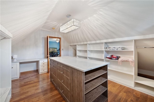 321 Ivy Dr, Pine Twp Nal, PA 15044 - walk in closet featuring lofted ceiling and wood finished floors