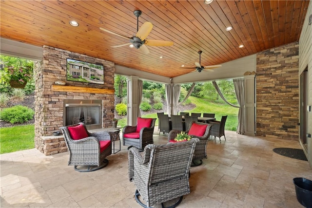 321 Ivy Dr, Pine Twp Nal, PA 15044 - view of patio with an outdoor living space with a fireplace, ceiling fan, and outdoor dining space