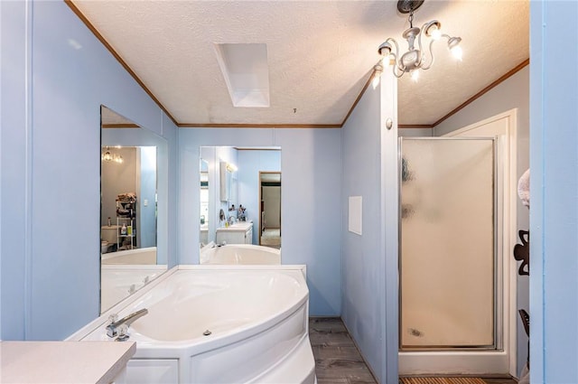 34 Max St, Hempfield Twp Wml, PA 15601 - bathroom featuring a shower stall, crown molding, wood finished floors, vanity, and a textured ceiling