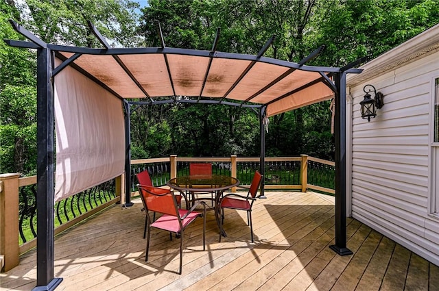 34 Max St, Hempfield Twp Wml, PA 15601 - wooden terrace featuring a pergola, outdoor dining space, and view of wooded area