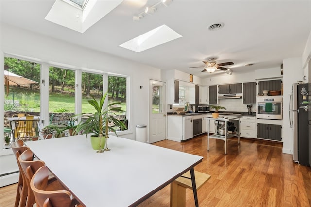 643 Croyland Ave, Indiana Boro, PA 15701 - dining area with a skylight, wood finished floors, and ceiling fan