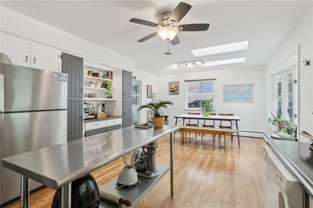 643 Croyland Ave, Indiana Boro, PA 15701 - kitchen with freestanding refrigerator, a skylight, healthy amount of natural light, and ceiling fan