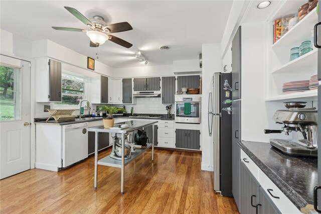 643 Croyland Ave, Indiana Boro, PA 15701 - kitchen featuring appliances with stainless steel finishes, under cabinet range hood, a sink, and dark countertops