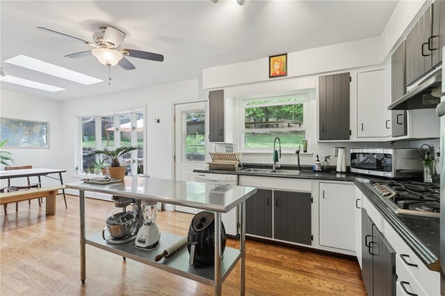 643 Croyland Ave, Indiana Boro, PA 15701 - kitchen featuring appliances with stainless steel finishes, a sink, dark countertops, and a ceiling fan