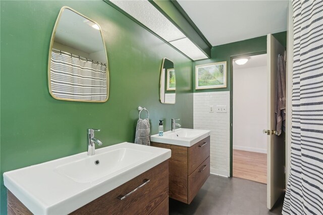643 Croyland Ave, Indiana Boro, PA 15701 - full bathroom featuring two vanities