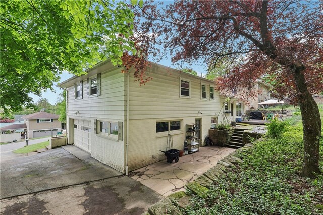 643 Croyland Ave, Indiana Boro, PA 15701 - back of house with concrete driveway and brick siding