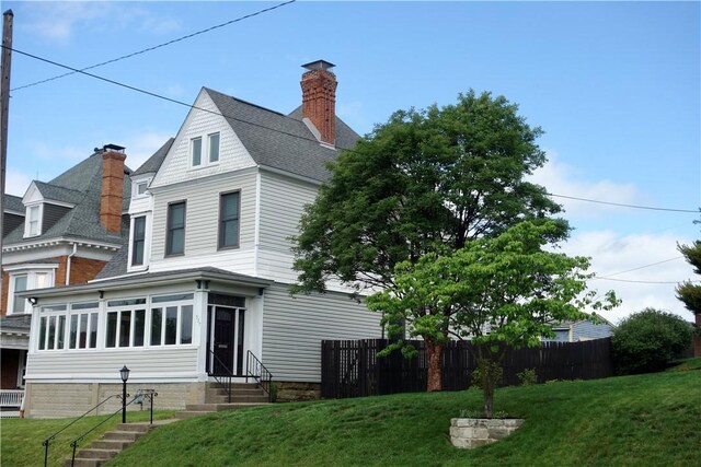 537 E Chestnut St E, Washington Boro, PA 15301 - view of side of property featuring entry steps, a chimney, and a shingled roof