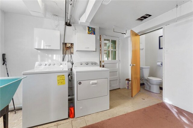 5221 Gerry Dr, Baldwin Boro, PA 15236 - laundry room with washer and dryer and cabinet space