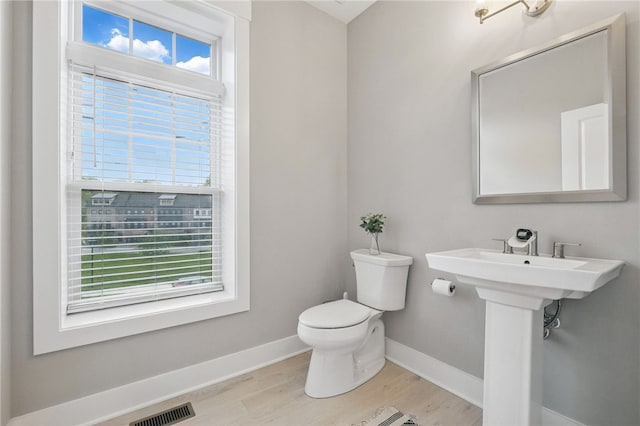 349 Azalea Dr, Peters Twp, PA 15367 - bathroom with toilet, wood finished floors, baseboards, and a sink
