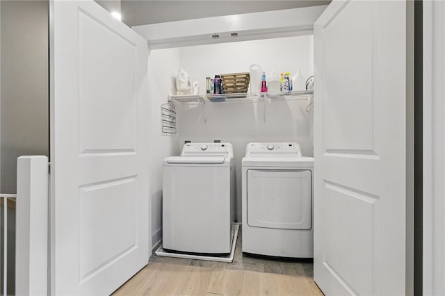 349 Azalea Dr, Peters Twp, PA 15367 - washroom with washer and dryer and light wood-style floors