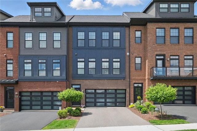 349 Azalea Dr, Peters Twp, PA 15367 - townhome / multi-family property featuring driveway, an attached garage, and brick siding