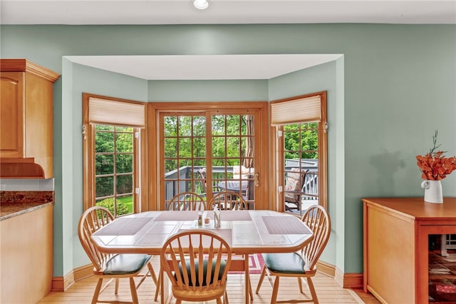 104 Autumn Way, Peters Twp, PA 15367 - dining room with plenty of natural light, baseboards, and light wood-type flooring
