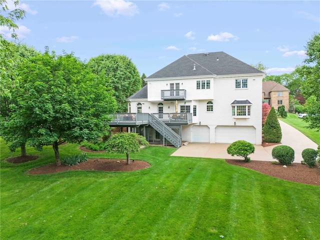 104 Autumn Way, Peters Twp, PA 15367 - back of house featuring an attached garage, stairway, a lawn, and a balcony