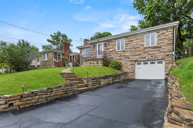 920 Maple Ave, Castle Shannon, PA 15234 - view of front of house featuring stone siding, an attached garage, asphalt driveway, and a front yard