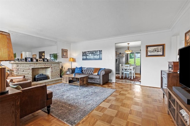 920 Maple Ave, Castle Shannon, PA 15234 - living room featuring baseboards, a brick fireplace, crown molding, and a chandelier