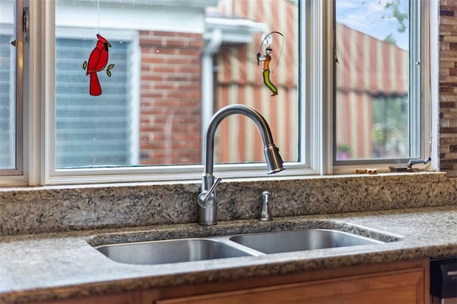920 Maple Ave, Castle Shannon, PA 15234 - kitchen view of a sink, dishwashing machine, and brown cabinetry