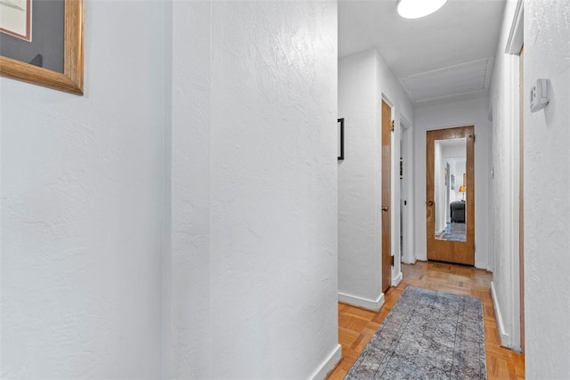 920 Maple Ave, Castle Shannon, PA 15234 - hall featuring a textured wall, baseboards, and attic access