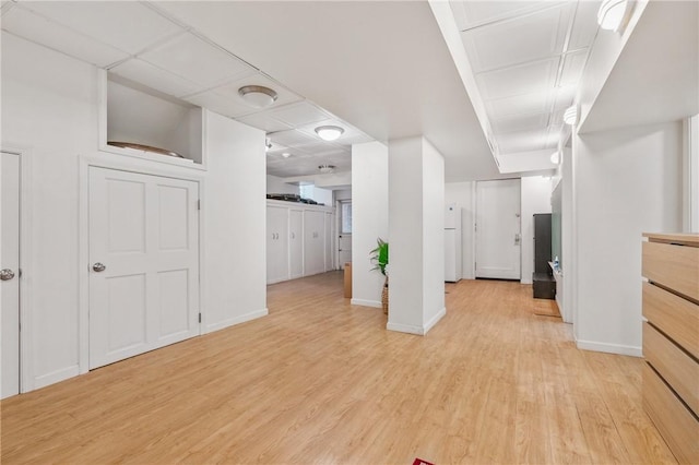 1800 Wightman St, Squirrel Hill, PA 15217 - interior space with light wood-style flooring, freestanding refrigerator, baseboards, and a drop ceiling