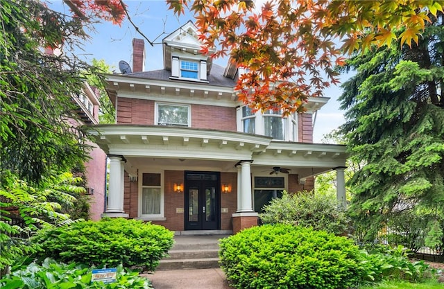 1800 Wightman St, Squirrel Hill, PA 15217 - traditional style home featuring a porch, a ceiling fan, and a chimney