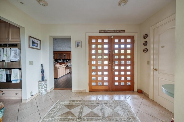 3098 Clay Pike St, Sewickley Twp, PA 15637 - entrance foyer with light tile patterned floors and baseboards